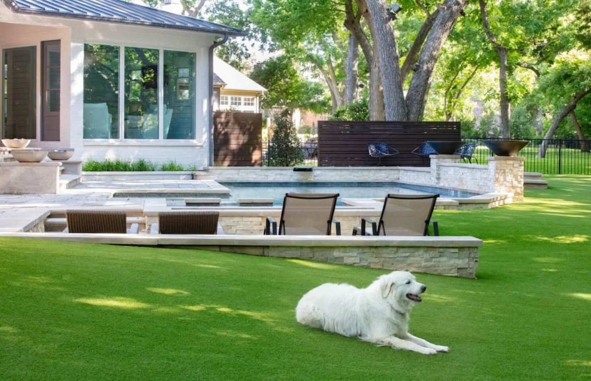 Happy dog relaxing on pet-safe artificial grass in Antioch, CA
